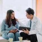 Doctor patiently explaining how to use tms for suicidal ideation​ and depression