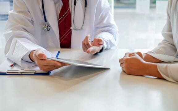 High-frequency rTMS represented by a conversation between a doctor and a patient