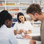 Pharmacist discusses low antidepressant success rates with a patient