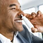 Happy patient takes spravato after learning how it can help him recover from Depression in the spravato medication guide