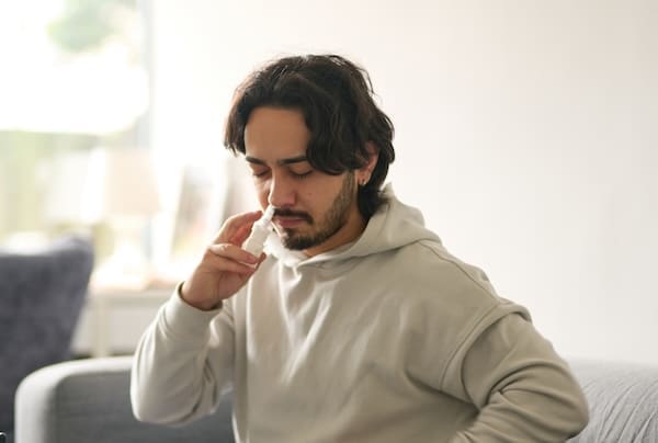Man using Spravato to demonstrate the Spravato experience in his doctor's office